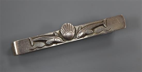A Georg Jensen sterling shell and twin dolphin tie clip, no. 73, 57mm.